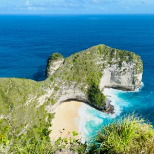 A breathtaking aerial view of Kelingking Beach's iconic cliffs in Bali, Indonesia.